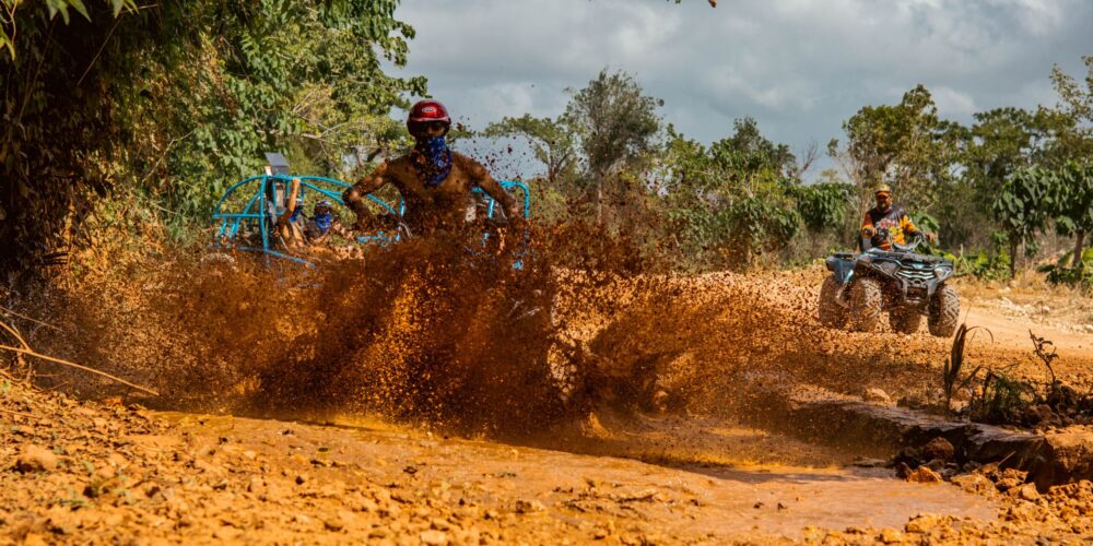 Thrilling buggy ride through the countryside, with participants navigating rugged trails and scenic landscapes in off-road vehicles, experiencing the natural beauty and adventure of rural terrain.