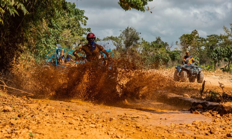 Thrilling buggy ride through the countryside, with participants navigating rugged trails and scenic landscapes in off-road vehicles, experiencing the natural beauty and adventure of rural terrain.