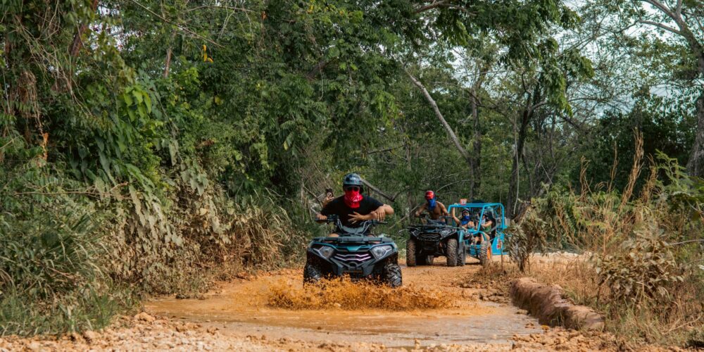 Thrilling buggy ride through the countryside, with participants navigating rugged trails and scenic landscapes in off-road vehicles, experiencing the natural beauty and adventure of rural terrain.