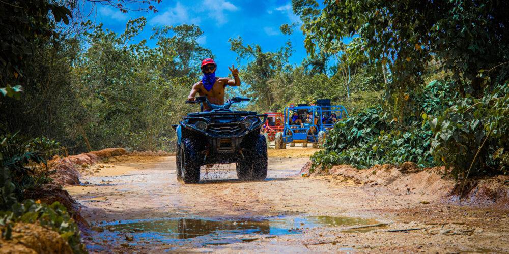 Thrilling buggy ride through the countryside, with participants navigating rugged trails and scenic landscapes in off-road vehicles, experiencing the natural beauty and adventure of rural terrain.