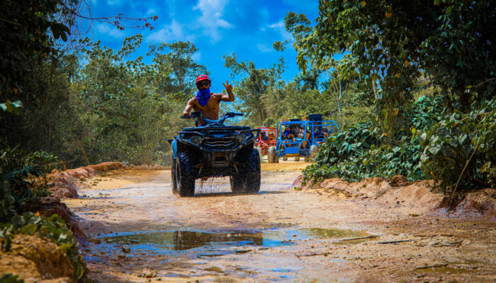 Thrilling buggy ride through the countryside, with participants navigating rugged trails and scenic landscapes in off-road vehicles, experiencing the natural beauty and adventure of rural terrain.