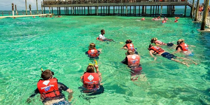 Exciting aquatic adventure featuring a combination of sailing splash activities, speed boat rides, snorkeling explorations, and relaxing catamaran cruises, offering a diverse range of experiences on the water with vibrant marine life and stunning ocean views