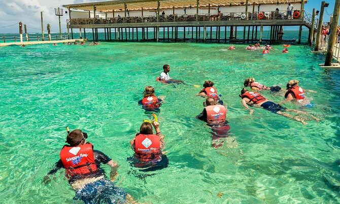 Exciting aquatic adventure featuring a combination of sailing splash activities, speed boat rides, snorkeling explorations, and relaxing catamaran cruises, offering a diverse range of experiences on the water with vibrant marine life and stunning ocean views