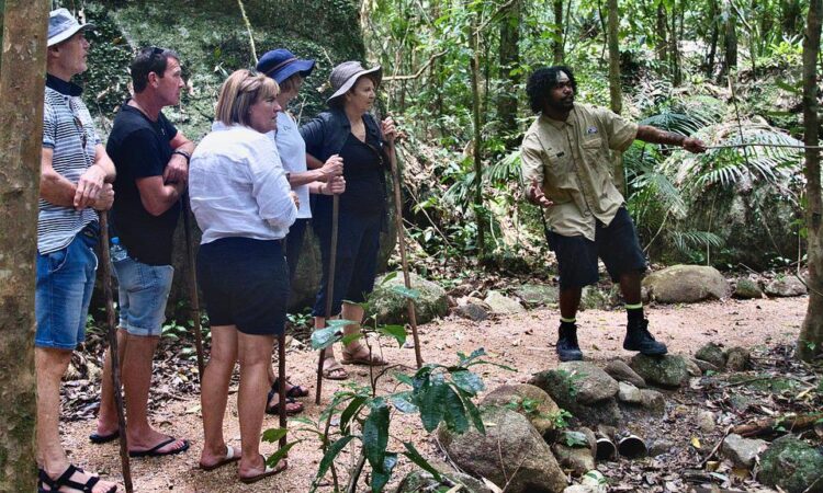 Personal guide assisting travelers with a customized tour, providing expert knowledge and engaging commentary while leading them through scenic or cultural destinations, ensuring an informative and personalized experience.