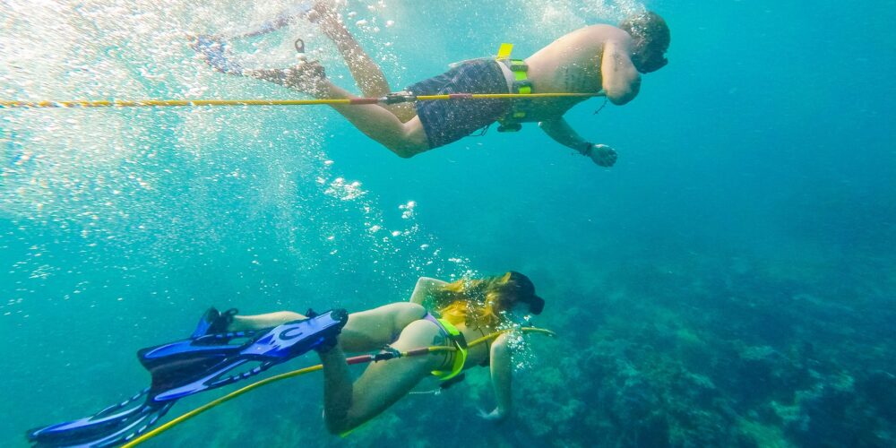 Explore Punta Cana with our combo: Hookah Diving in Bávaro’s reefs and a lively Power Cruise Party Boat for an unforgettable day!