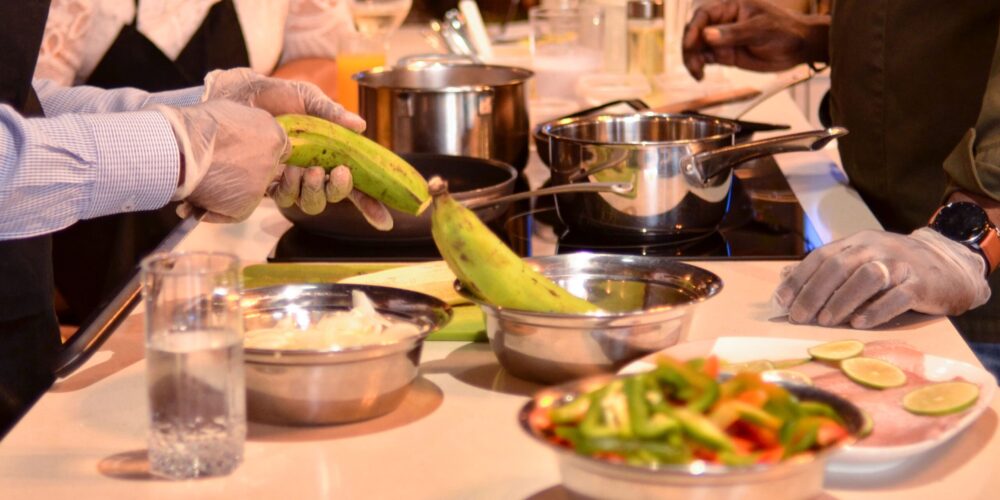 Traditional Sancocho Cooking Master Class, guiding participants through the process of preparing the Dominican Republic's signature stew with a blend of meats, root vegetables, and spices.