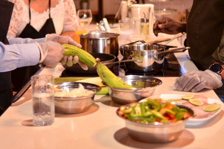 Traditional Sancocho Cooking Master Class, guiding participants through the process of preparing the Dominican Republic's signature stew with a blend of meats, root vegetables, and spices.