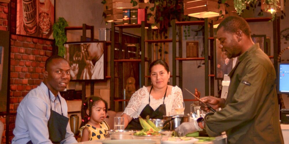 Traditional Sancocho Cooking Master Class, guiding participants through the process of preparing the Dominican Republic's signature stew with a blend of meats, root vegetables, and spices.