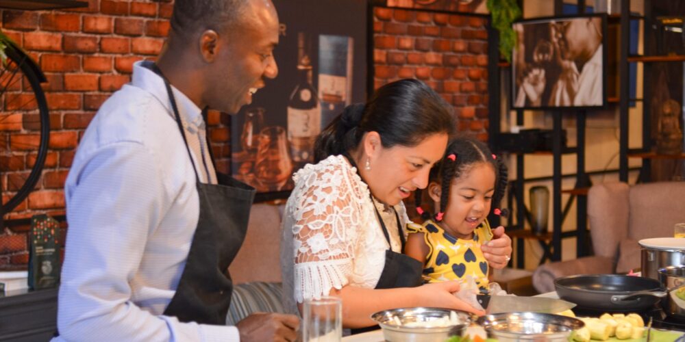 Traditional Sancocho Cooking Master Class, guiding participants through the process of preparing the Dominican Republic's signature stew with a blend of meats, root vegetables, and spices.