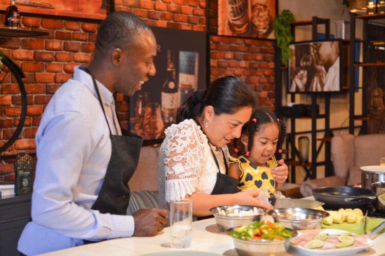 Traditional Sancocho Cooking Master Class, guiding participants through the process of preparing the Dominican Republic's signature stew with a blend of meats, root vegetables, and spices.