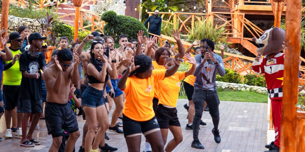 Colorful Carnival Show featuring lively dancers in extravagant costumes, vibrant masks, and rhythmic music, celebrating the festive spirit and cultural heritage of the Caribbean.