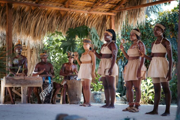 Vibrant Taíno Show performance, showcasing traditional dance, music, and colorful costumes that celebrate the culture and history of the indigenous Taíno people of the Caribbean.