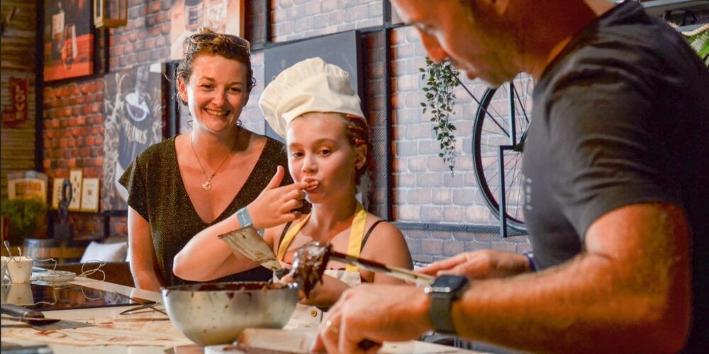 Hands-on Chocolate Master Class, teaching participants how to craft rich, artisanal chocolate from cacao beans, with techniques for tempering, molding, and flavoring.