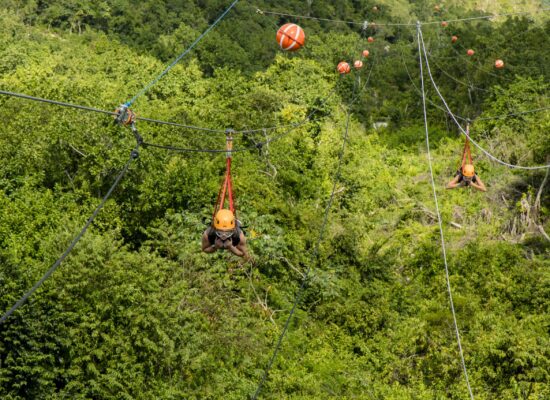 Adventure-filled Scape Park in Punta Cana, showcasing lush tropical landscapes, zip lines, underground caves, and natural cenotes for visitors to explore and enjoy