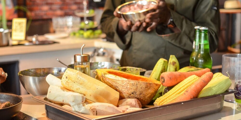 Traditional Sancocho Cooking Master Class, guiding participants through the process of preparing the Dominican Republic's signature stew with a blend of meats, root vegetables, and spices.