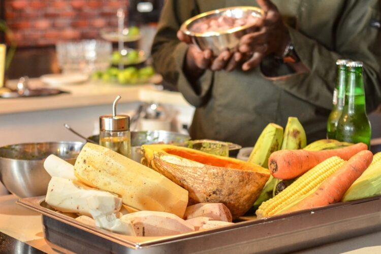 Traditional Sancocho Cooking Master Class, guiding participants through the process of preparing the Dominican Republic's signature stew with a blend of meats, root vegetables, and spices.