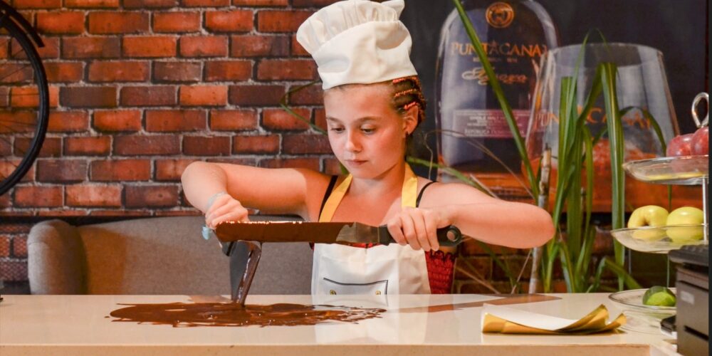 Hands-on Chocolate Master Class, teaching participants how to craft rich, artisanal chocolate from cacao beans, with techniques for tempering, molding, and flavoring.