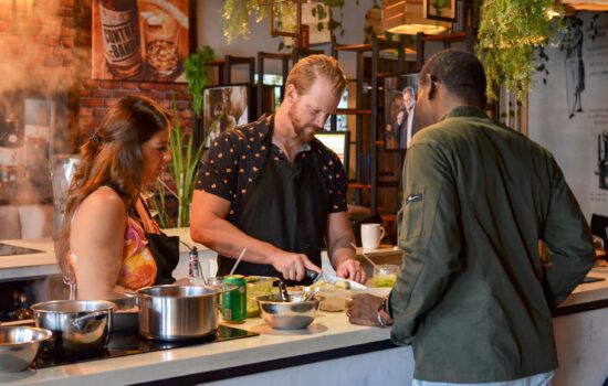 Traditional Sancocho Cooking Master Class, guiding participants through the process of preparing the Dominican Republic's signature stew with a blend of meats, root vegetables, and spices.