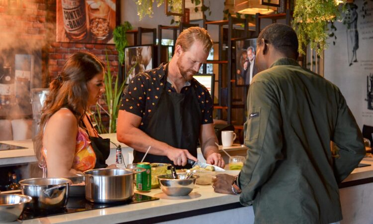 Traditional Sancocho Cooking Master Class, guiding participants through the process of preparing the Dominican Republic's signature stew with a blend of meats, root vegetables, and spices.