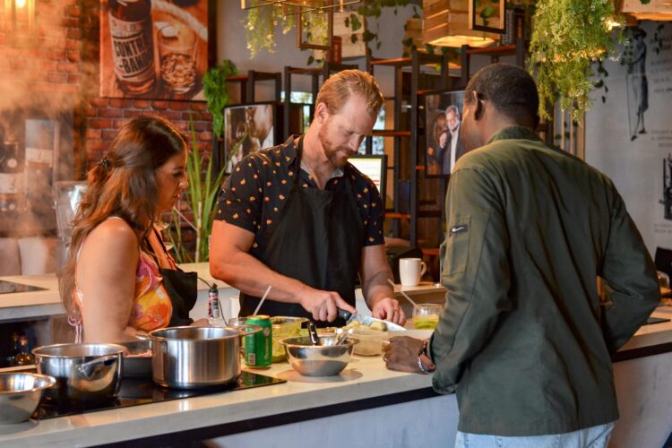 Traditional Sancocho Cooking Master Class, guiding participants through the process of preparing the Dominican Republic's signature stew with a blend of meats, root vegetables, and spices.