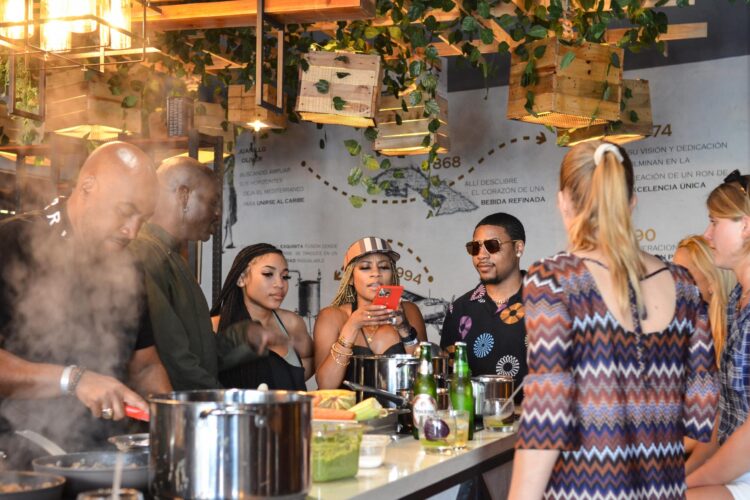 Traditional Sancocho Cooking Master Class, guiding participants through the process of preparing the Dominican Republic's signature stew with a blend of meats, root vegetables, and spices.