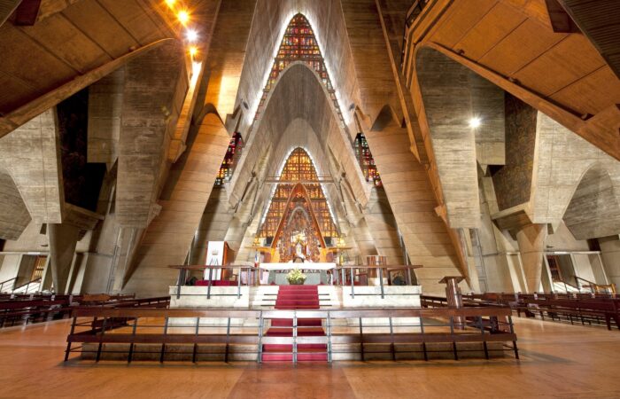 Basilica Interior Iconic view of the Higüey Cathedral, also known as La Basilica, featuring its towering arched structure and modern architectural design, a famous religious landmark in the Dominican Republic.