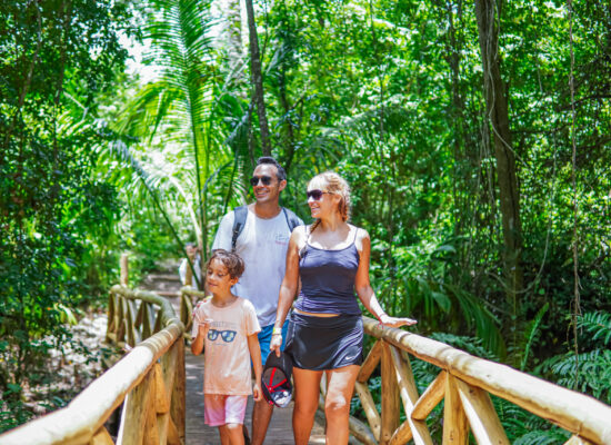 Adventure-filled Scape Park in Punta Cana, showcasing lush tropical landscapes, zip lines, underground caves, and natural cenotes for visitors to explore and enjoy