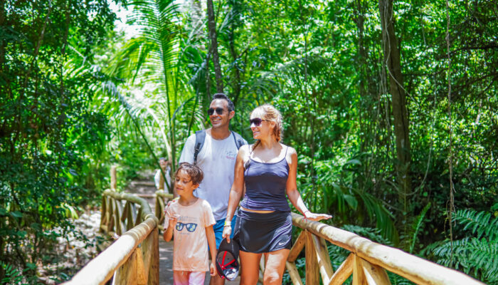 Adventure-filled Scape Park in Punta Cana, showcasing lush tropical landscapes, zip lines, underground caves, and natural cenotes for visitors to explore and enjoy