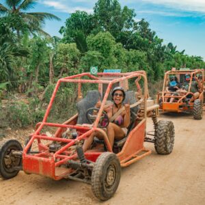 Thrilling buggy ride through the countryside, with participants navigating rugged trails and scenic landscapes in off-road vehicles, experiencing the natural beauty and adventure of rural terrain.