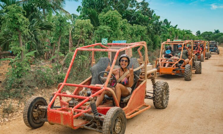 Thrilling buggy ride through the countryside, with participants navigating rugged trails and scenic landscapes in off-road vehicles, experiencing the natural beauty and adventure of rural terrain.