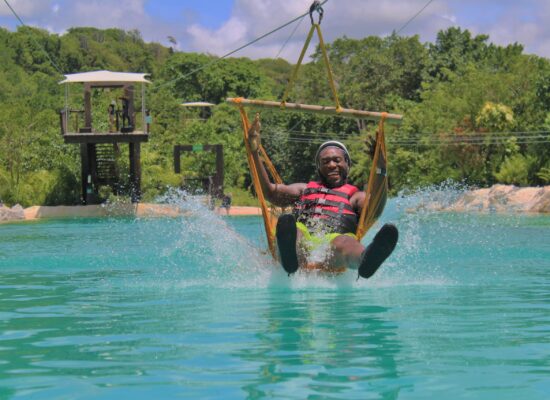 Adventure-filled Scape Park in Punta Cana, showcasing lush tropical landscapes, zip lines, underground caves, and natural cenotes for visitors to explore and enjoy