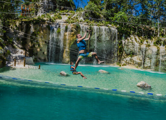 Adventure-filled Scape Park in Punta Cana, showcasing lush tropical landscapes, zip lines, underground caves, and natural cenotes for visitors to explore and enjoy