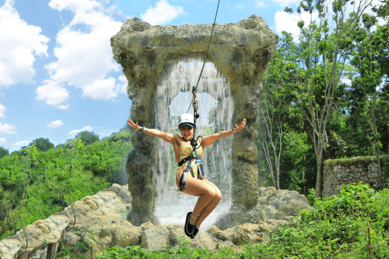 Adventure-filled Scape Park in Punta Cana, showcasing lush tropical landscapes, zip lines, underground caves, and natural cenotes for visitors to explore and enjoy