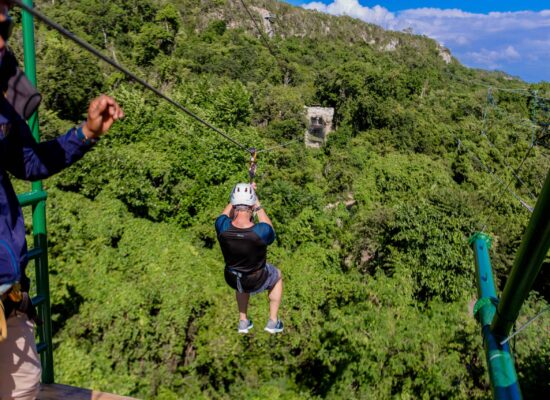 Adventure-filled Scape Park in Punta Cana, showcasing lush tropical landscapes, zip lines, underground caves, and natural cenotes for visitors to explore and enjoy