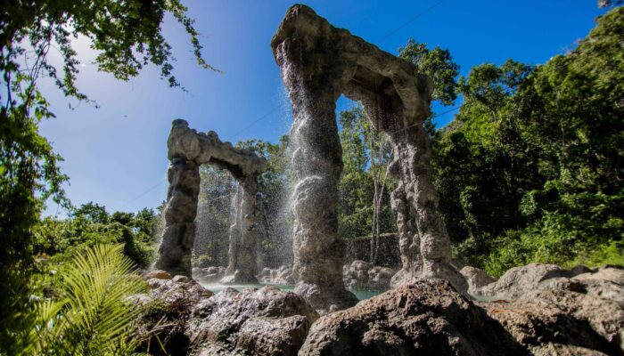 Adventure-filled Scape Park in Punta Cana, showcasing lush tropical landscapes, zip lines, underground caves, and natural cenotes for visitors to explore and enjoy