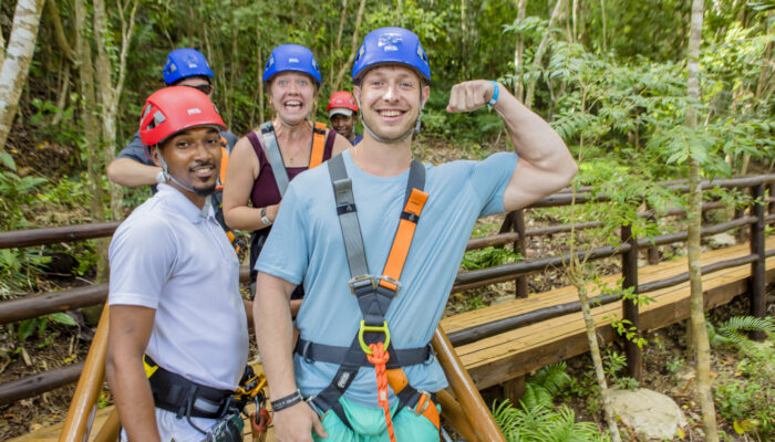 Adventure-filled Scape Park in Punta Cana, showcasing lush tropical landscapes, zip lines, underground caves, and natural cenotes for visitors to explore and enjoy