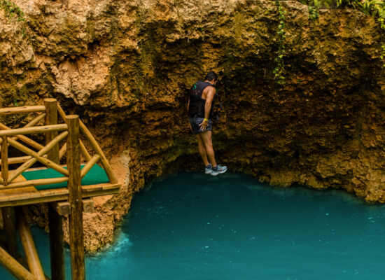 Adventure-filled Scape Park in Punta Cana, showcasing lush tropical landscapes, zip lines, underground caves, and natural cenotes for visitors to explore and enjoy