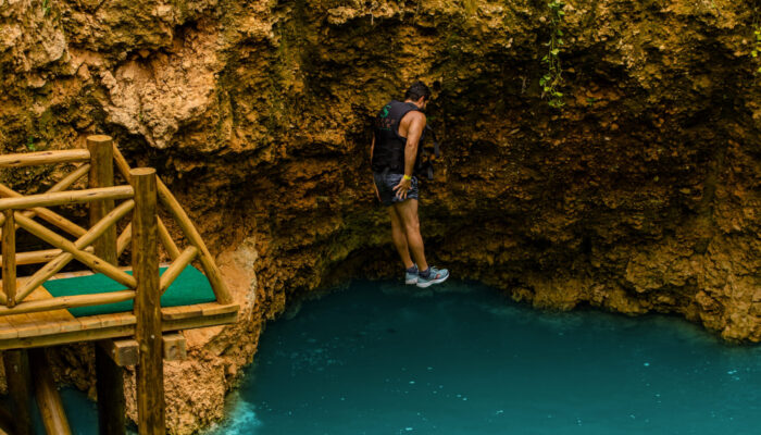 Adventure-filled Scape Park in Punta Cana, showcasing lush tropical landscapes, zip lines, underground caves, and natural cenotes for visitors to explore and enjoy