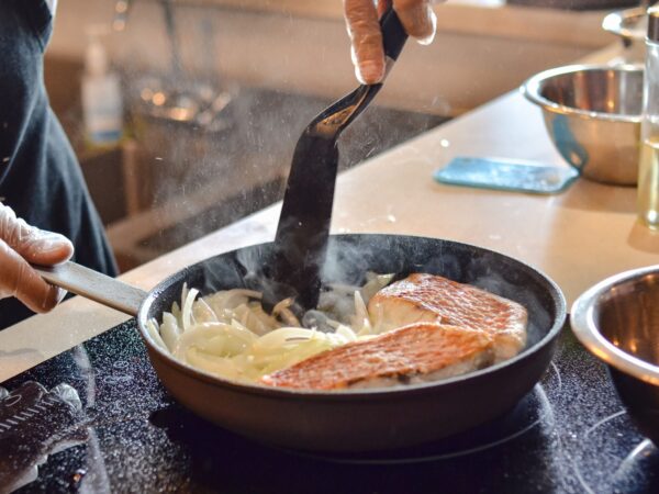 Chef-led class on Cooking Red Snapper in Coconut Milk, featuring fresh preparation techniques, seasoning tips, and step-by-step instructions for creating a delicious seafood dish.