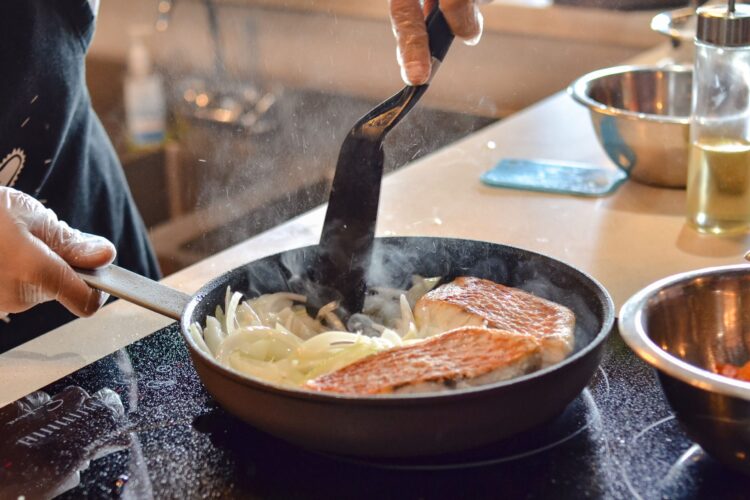 Chef-led class on Cooking Red Snapper in Coconut Milk, featuring fresh preparation techniques, seasoning tips, and step-by-step instructions for creating a delicious seafood dish.