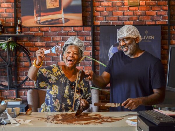 Hands-on Chocolate Master Class, teaching participants how to craft rich, artisanal chocolate from cacao beans, with techniques for tempering, molding, and flavoring.