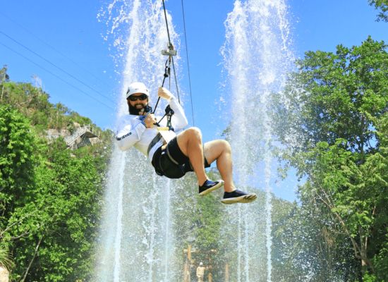 Adventure-filled Scape Park in Punta Cana, showcasing lush tropical landscapes, zip lines, underground caves, and natural cenotes for visitors to explore and enjoy