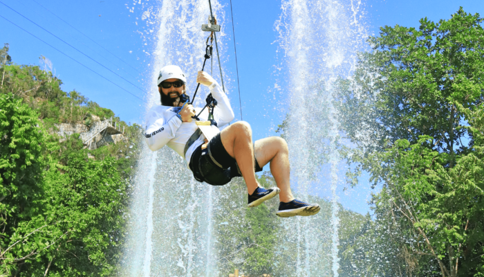 Adventure-filled Scape Park in Punta Cana, showcasing lush tropical landscapes, zip lines, underground caves, and natural cenotes for visitors to explore and enjoy