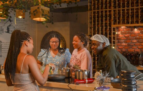 Traditional Sancocho Cooking Master Class, guiding participants through the process of preparing the Dominican Republic's signature stew with a blend of meats, root vegetables, and spices.