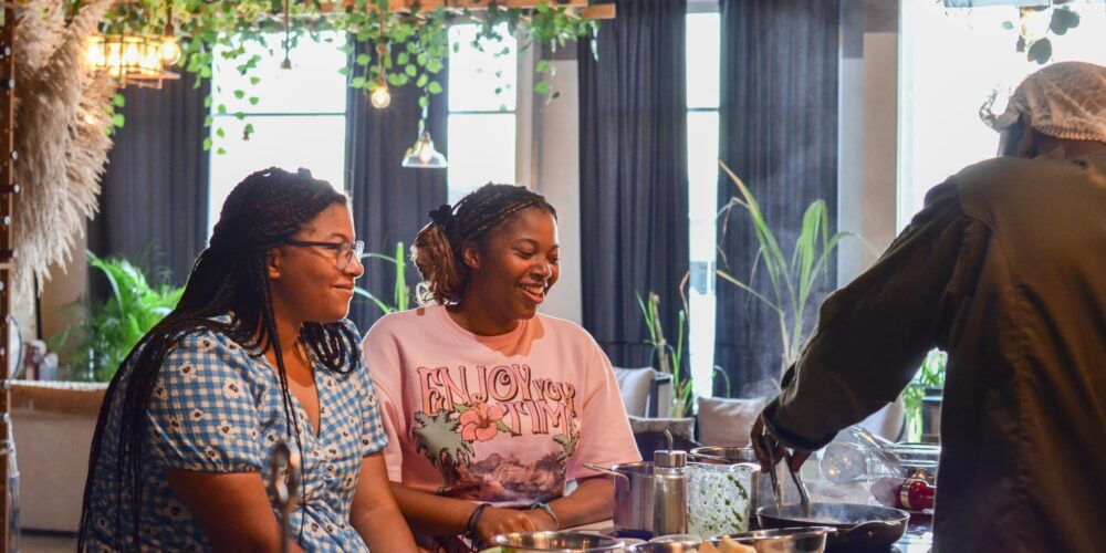 Traditional Sancocho Cooking Master Class, guiding participants through the process of preparing the Dominican Republic's signature stew with a blend of meats, root vegetables, and spices.