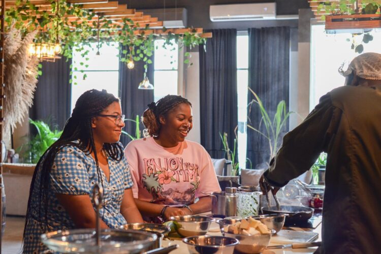 Traditional Sancocho Cooking Master Class, guiding participants through the process of preparing the Dominican Republic's signature stew with a blend of meats, root vegetables, and spices.