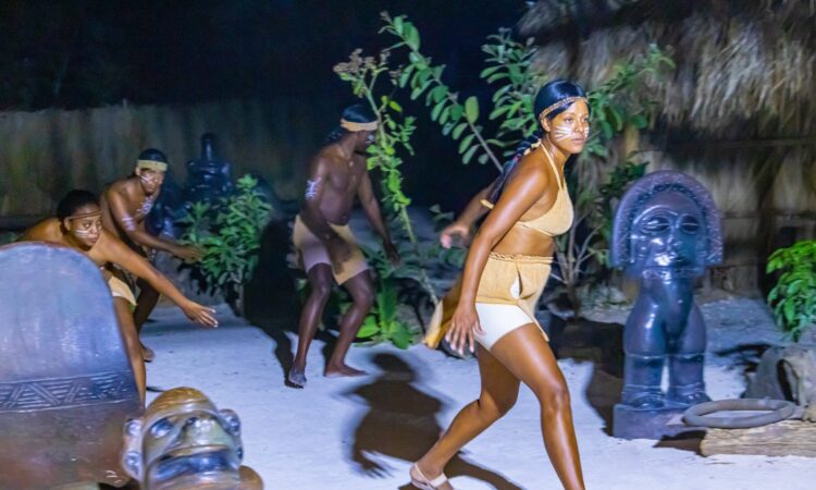 Vibrant Taíno Show performance, showcasing traditional dance, music, and colorful costumes that celebrate the culture and history of the indigenous Taíno people of the Caribbean.